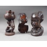 An African carved ebony bust, a similar shallow relief bust, and a jar and cover, formed as a figure