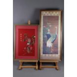 A Chinese silk embroidered panel of peacocks, 11" x 18", in strip frame, and a print of cranes, in