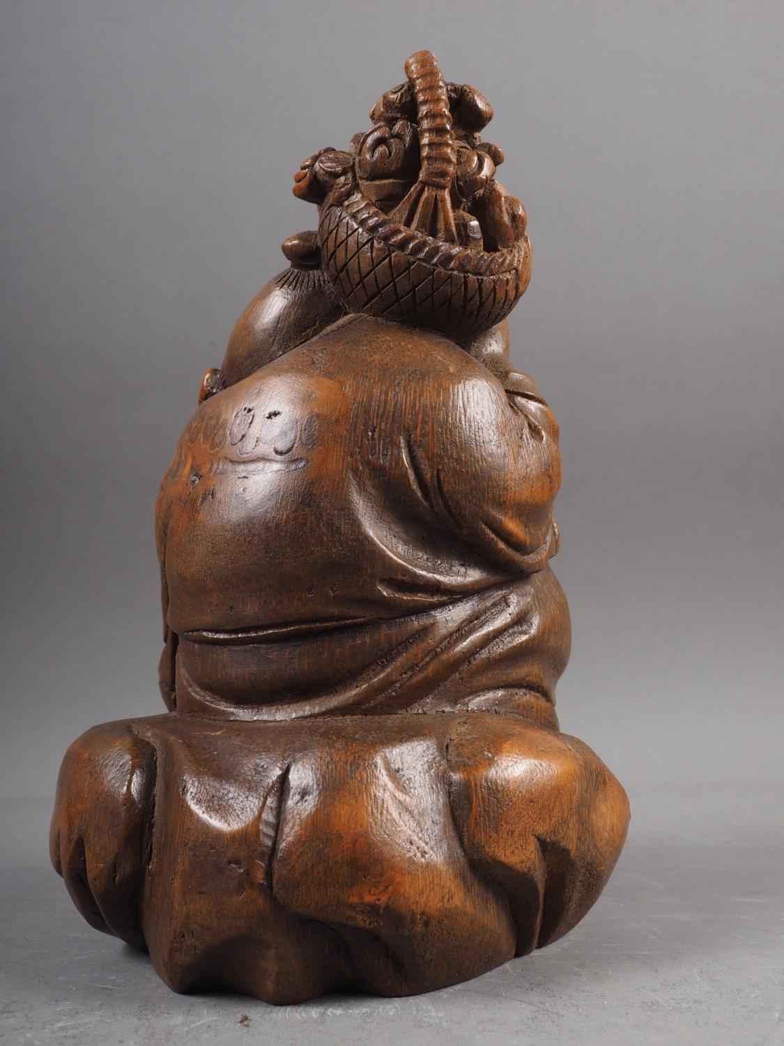 A Japanese carved bamboo figure of a Buddha, 7 1/4" high - Image 2 of 3