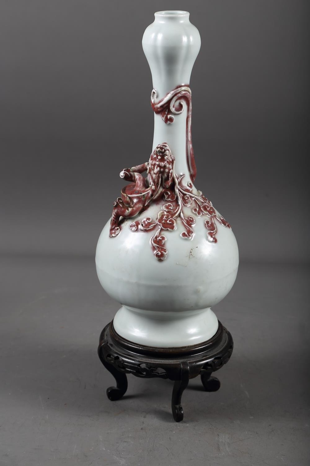 A Chinese pale glazed bottle neck vase with relief iron oxide coloured dragon decoration, 11 3/4" - Image 2 of 6