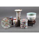 A Chinese famille rose jardiniere with panels of precious object and fruit decoration, 4" dia x 4