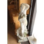 A cast stone figure of Venus, on a pedestal, 75" high overall