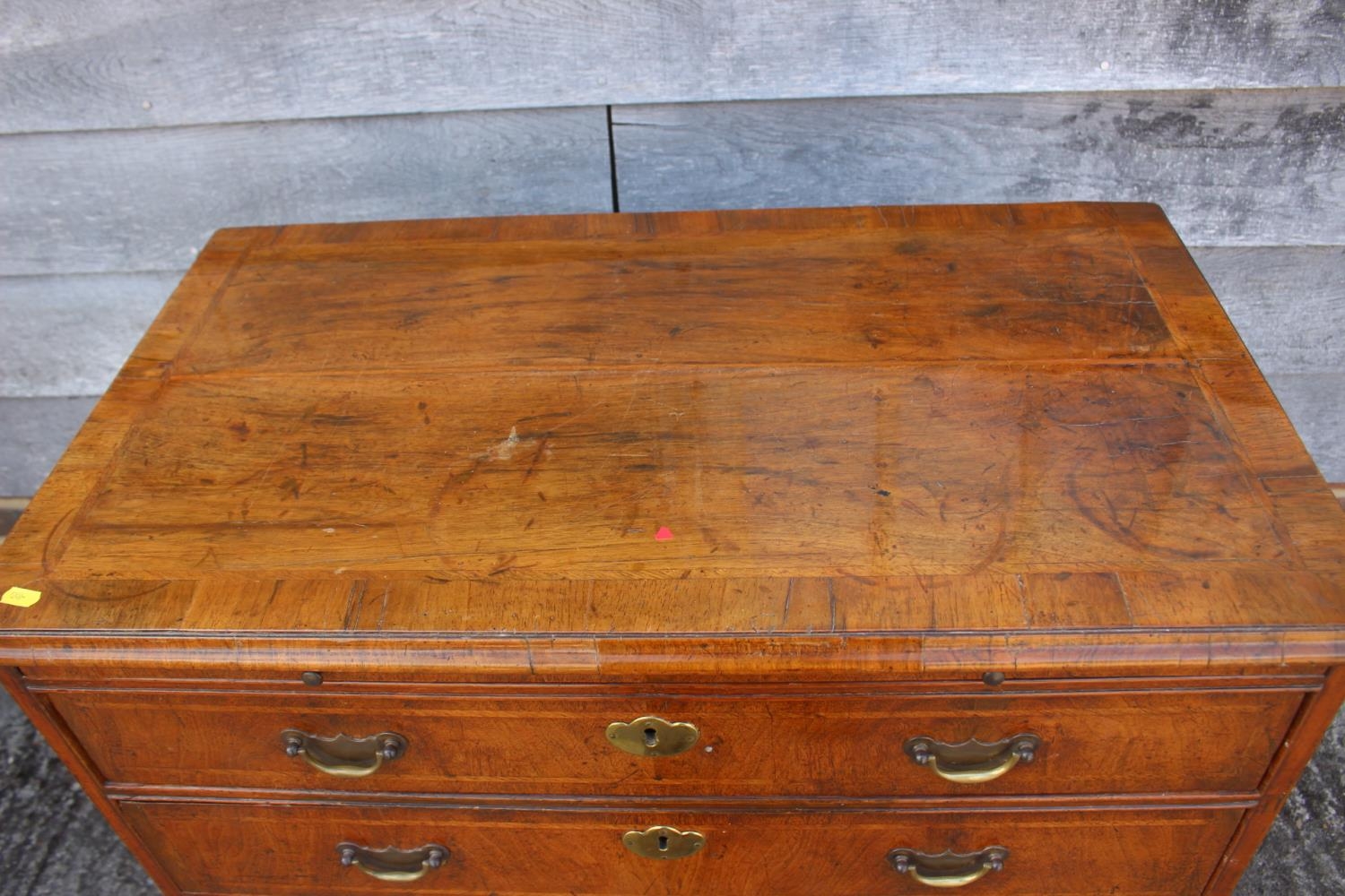 A bachelor's figured walnut and feather banded chest, fitted slide over four long graduated drawers, - Image 4 of 7