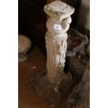 A carved stone floral pedestal with capital, 26" high