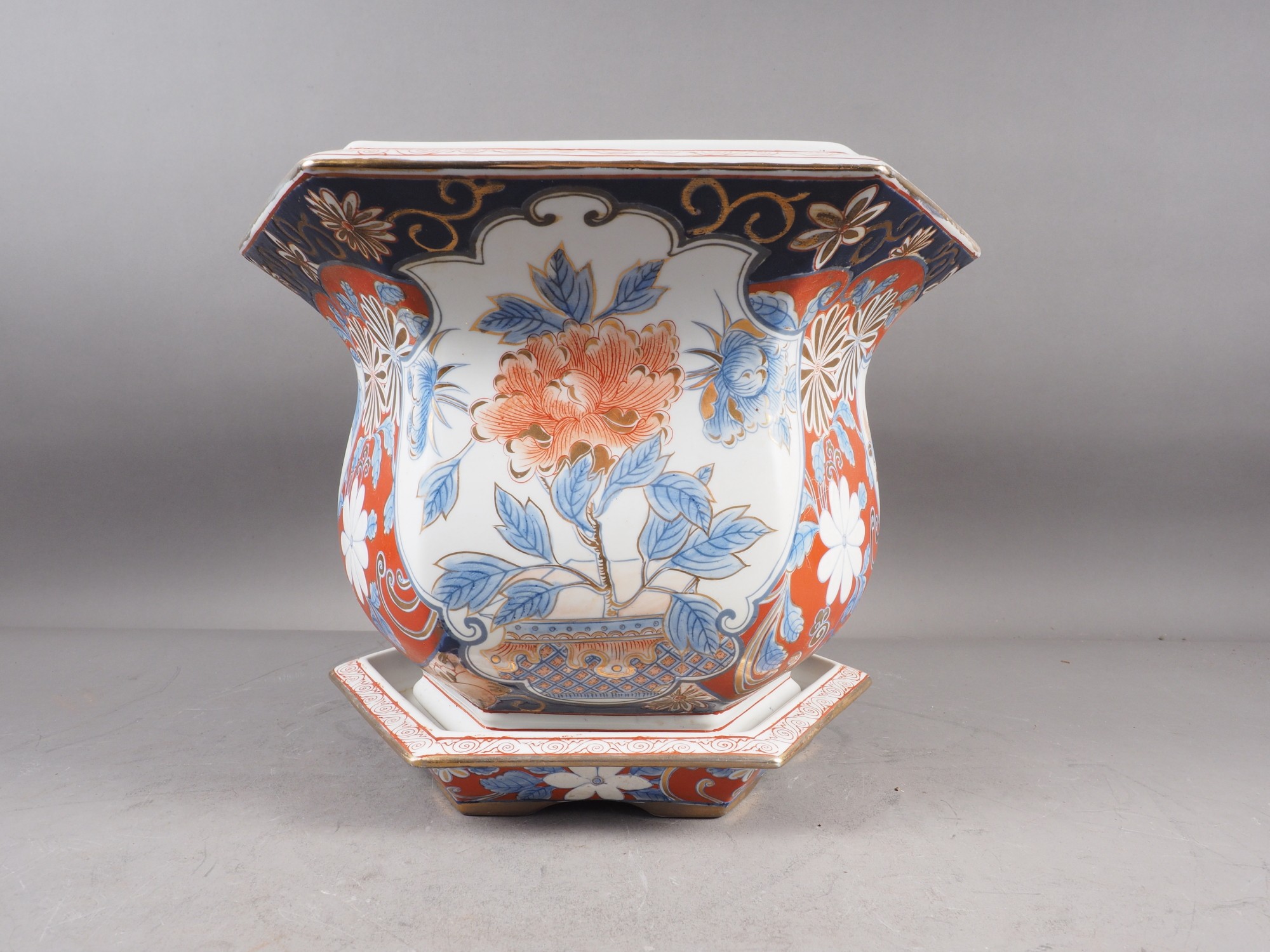 A hexagonal jardiniere with floral decoration in the Imari palette and a matching saucer - Image 2 of 3