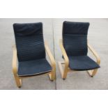 A pair of bentwood open armchairs with black seat cushions