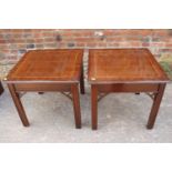 A pair of mahogany and banded lamp tables, on moulded and chamfered supports, 20" square x 18" high