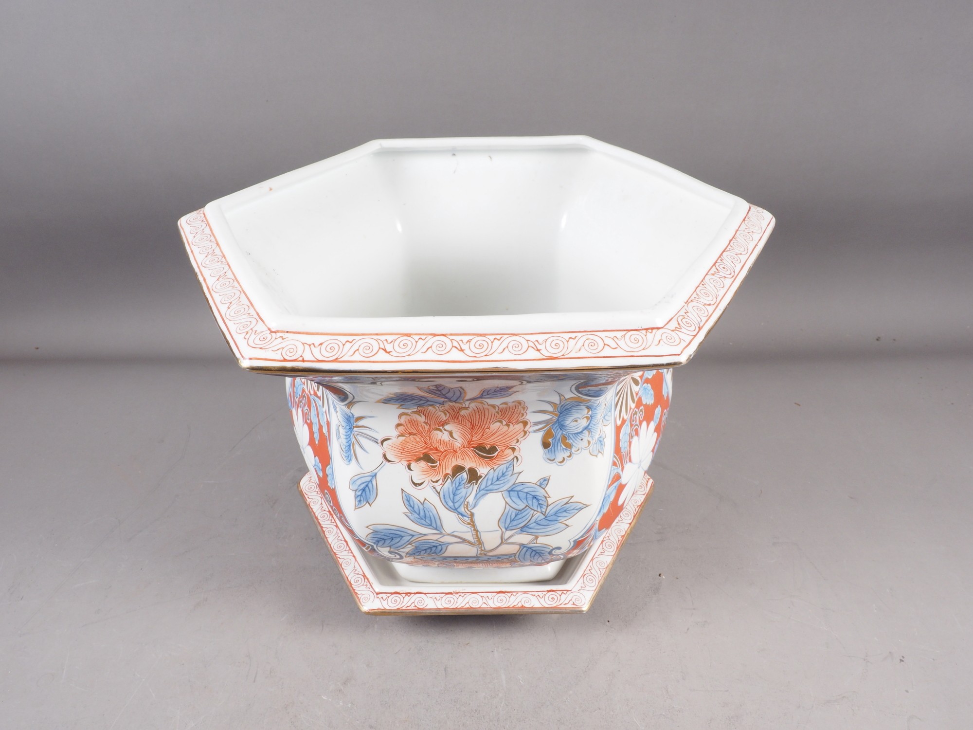 A hexagonal jardiniere with floral decoration in the Imari palette and a matching saucer - Image 3 of 3