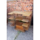 A 1960s oak display stand, fitted multiple shelves, on square base, 36" wide x 27" deep x 36" high