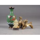 *A cloisonne vase with dragon decoration on a green ground, 9 1/2" high, two bronze mythical