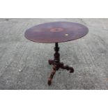 A late 19th century walnut and inlaid oval top occasional table, on turned column and tripod