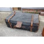A canvas and leather bound trunk, 36" wide