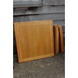 An oak square top dining table, on stile supports, 35" square x 30" high