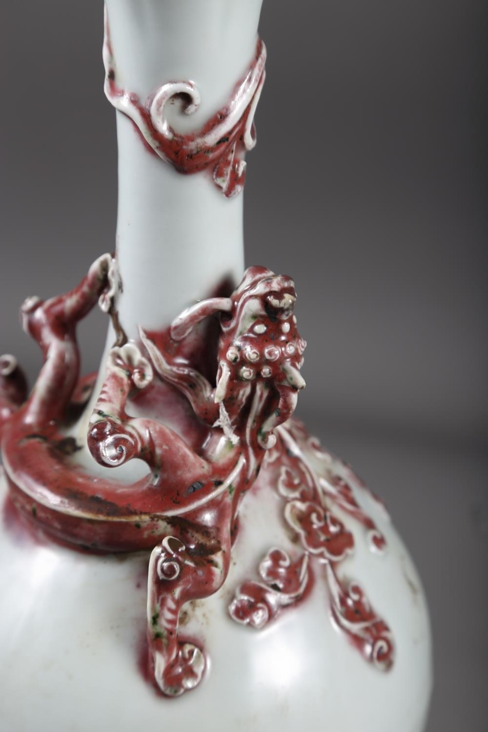 A Chinese pale glazed bottle neck vase with relief iron oxide coloured dragon decoration, 11 3/4" - Image 5 of 6