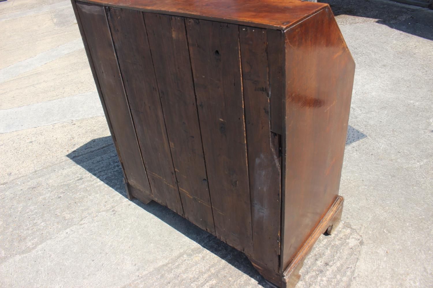 A Georgian mahogany bureau with fitted interior over four long graduated drawers, on bracket - Image 4 of 5