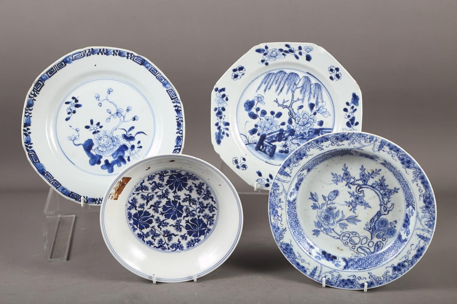 A Chinese blue and white dish with floral and scrolled decoration with seal mark to base, 7 1/2"