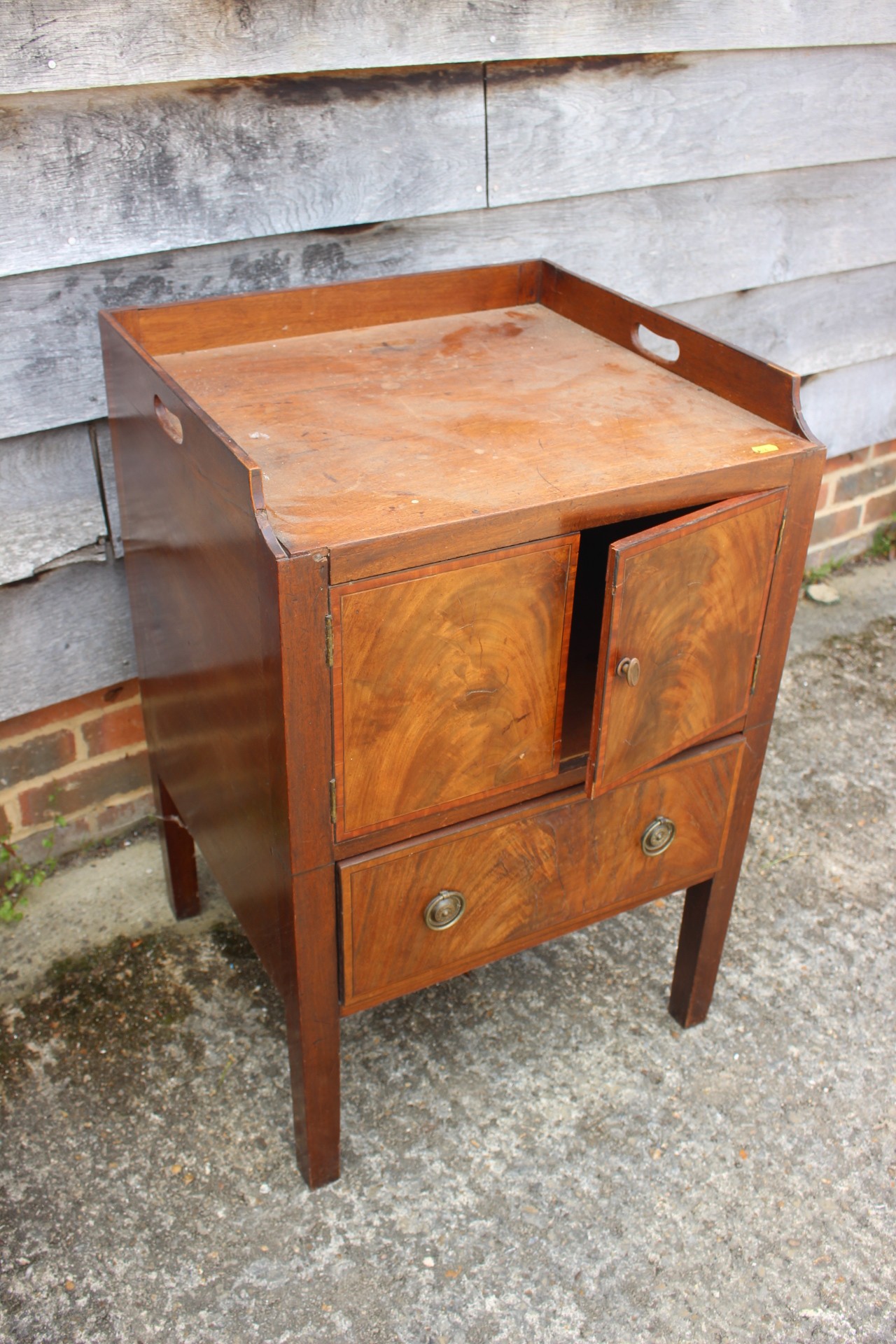 A 19th century mahogany tray top washstand, fitted cupboard over single drawer, 21" wide x 19 1/2"