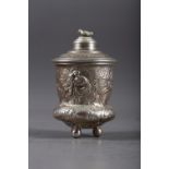 A Dutch silver tea caddy with embossed decoration and three ball feet, 5.9oz troy approx