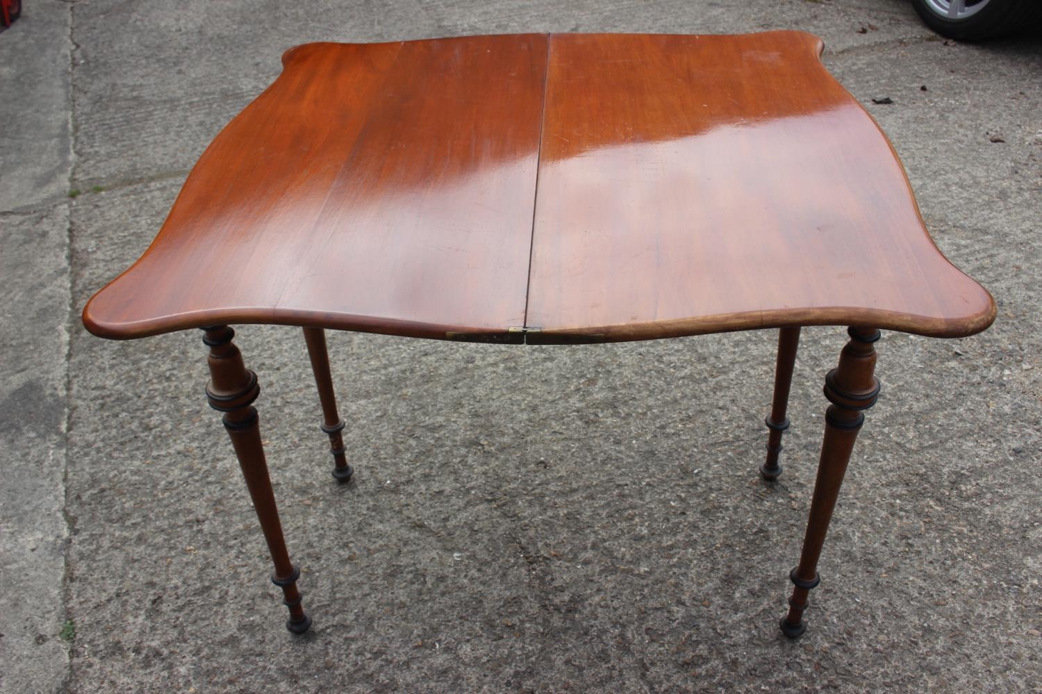 A late 19th century Scandinavian fold-over top serpentine front tea table, on ebonised banded - Image 4 of 5