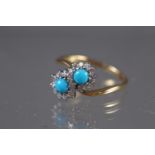 An 18ct gold, diamond and turquoise crossover cluster ring, size M, 3g