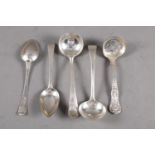 A pair of Georgian silver dessert spoons, a pair of Mappin & Webb ladles and a similar sifter spoon,