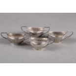 A set of four two-handled salts with reeded decoration, 3.5oz troy approx