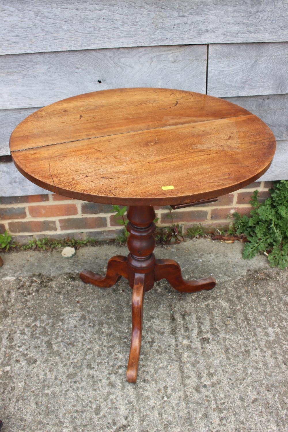 A 19th century provincial mahogany circular tilt top occasional table, on tripod splay supports, 24" - Image 2 of 2