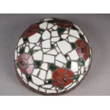 A Tiffany style stained glass ceiling shade with rose designs, 14" dia (damages)