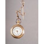 A lady's 14ct gold cased fob watch with white enamel dial and Arabic numerals, the back case