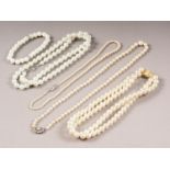 A cultured pearl single-strand necklace with marcasite set clasp, three faux pearl necklaces and a