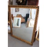 A gilt framed wall mirror with bevelled plate, 40" x 52" overall