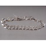 A white metal curb link bracelet, stamped "Tiffany & Co 925" and signed Elsa Peretti
