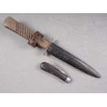 A WWI German trench knife with scabbard blade, 5 1/2" long, and a pruning knife