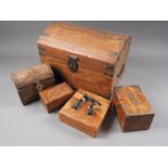 A camphor wood and metal mounted domed box with carry handles, 14 1/2" wide, and four other boxes