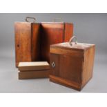 Three mahogany microscope cases and a hardwood storage box