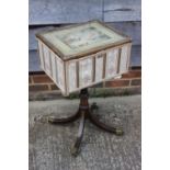 A 19th century work table/box with petit point panel top, on turned painted column and quadruple