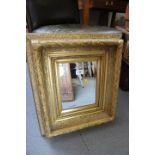 A gilt framed wall mirror with bevelled plate, 9 1/2" x 7 1/2"