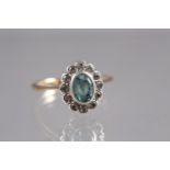 A yellow metal, white stone and blue topaz cluster ring, 2.5g, size 'N 1/2'