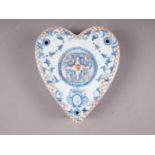 A 19th century heart-shaped polychrome decorated Delftware inkwell, 8" wide