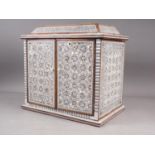 A mahogany and mother-of-pearl inlaid jewellery cabinet, 13" high