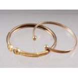 A 9ct gold bangle, 3.5g, and a Victorian yellow metal bangle, 8.8g