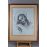 A charcoal sketch, bust of Christ, 22" x 18", in wash lined mount and strip frame
