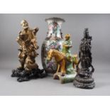 *A Chinese Tang style horse and rider, 12 1/2" high, a giltwood figure of a man and a beast, on