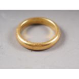 A 22ct gold wedding band, 7g, size L