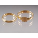 An 18ct gold wedding band, size L, 3.8g, and a Scottish 18ct gold signet ring, 4.1g, size T