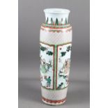 A Chinese famille verte vase with panels of figures in a landscape decoration, 18 1/2" high