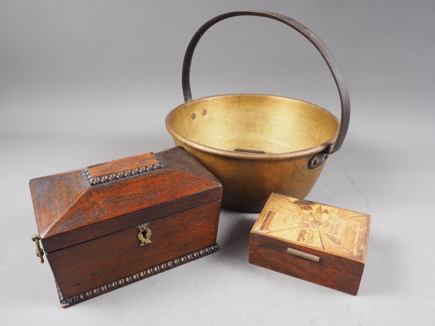 A 19th century rosewood tea caddy, 8" wide, a marquetry cigarette box and a 19th century brass