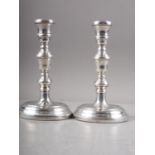 A pair of filled silver candlesticks, 7" high