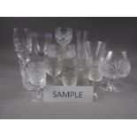 A cut glass part table service, and a quantity of champagne flutes, coupes and other glassware