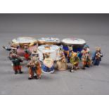 Four enamelled pill boxes, a set of miniature painted lead mouse musicians and a similar set of
